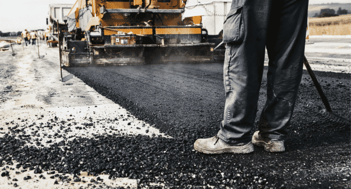 Road compaction and watering operation